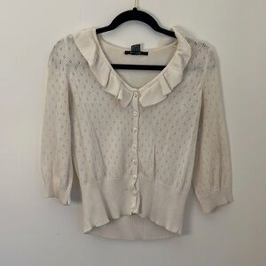 White ruffle neckline sweater